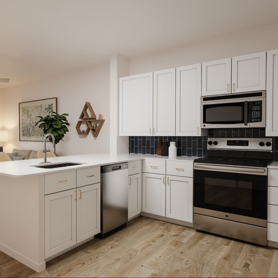 kitchen with ample counter-space, modern appliances and bright lighting