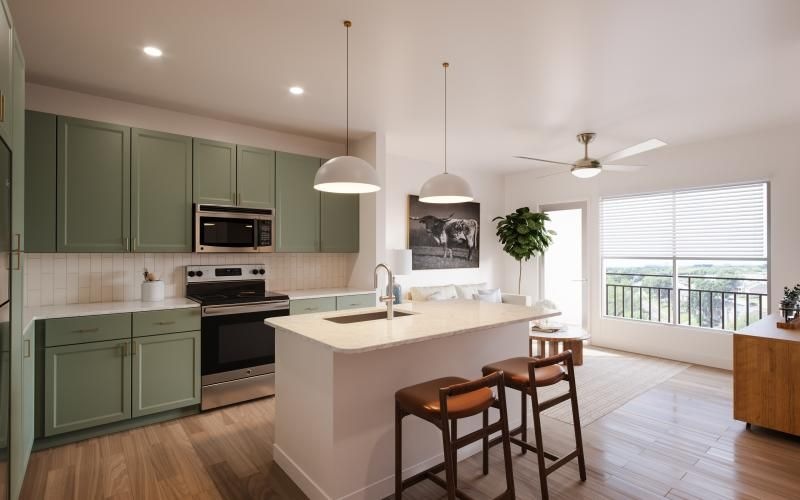 a kitchen with green cabinets