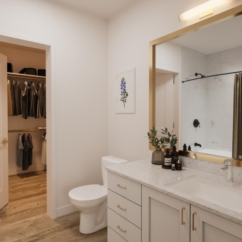 a bathroom with a mirror and sink
