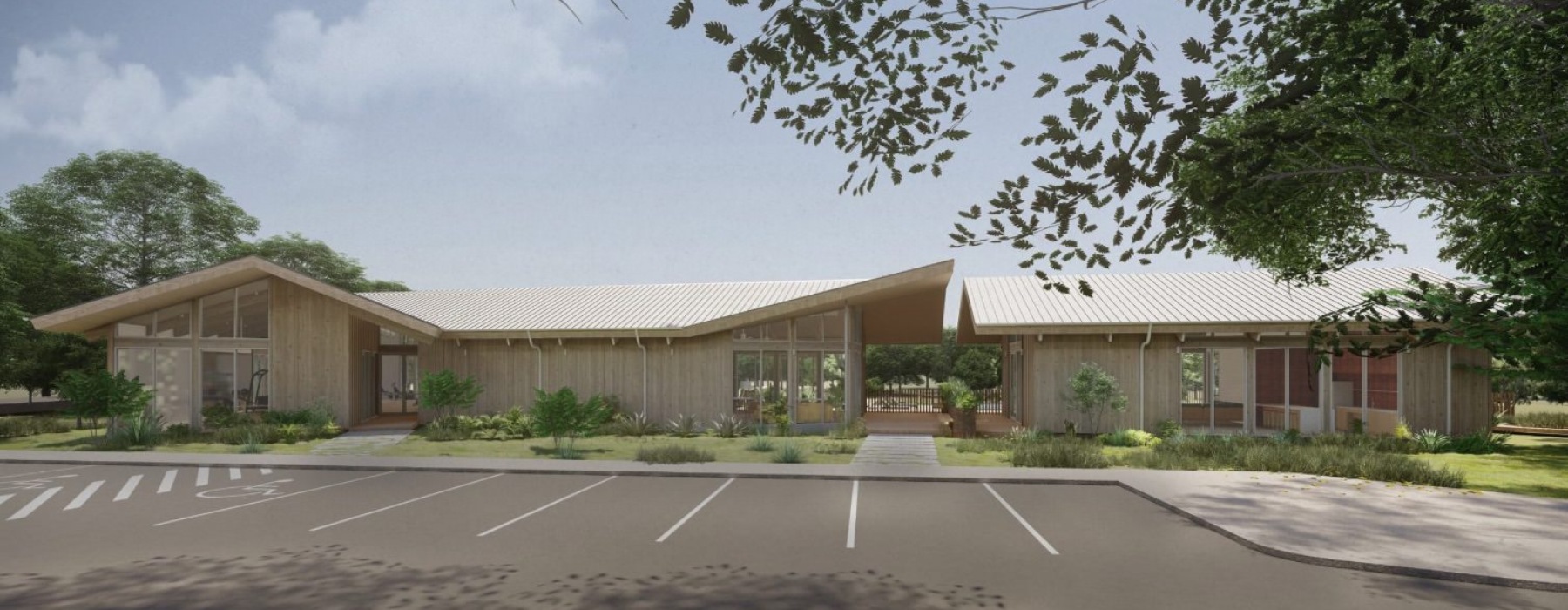 a long building with a parking lot